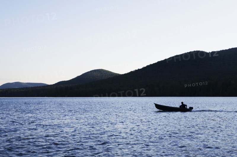 Motorboat on Lake Placid. Photo. Chris Hackett