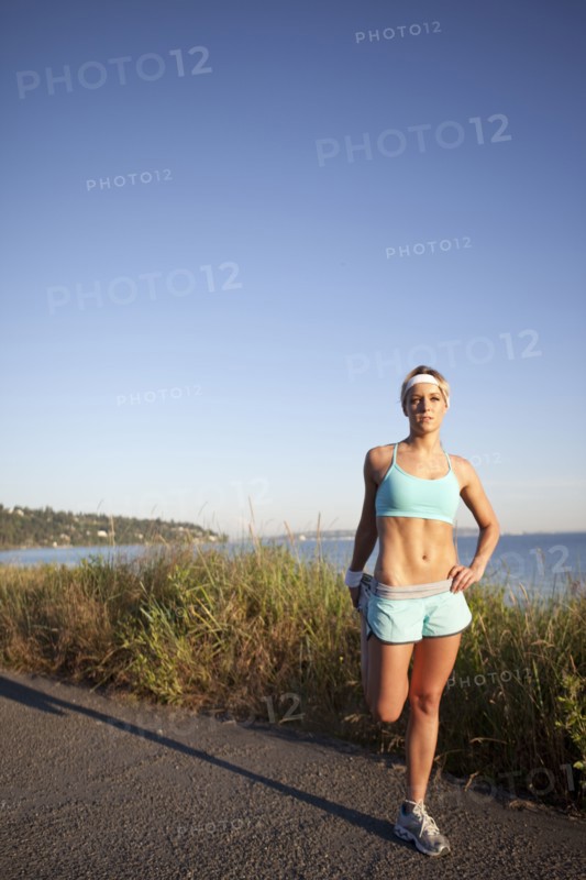 Runner stretching. Photo. Take A Pix Media