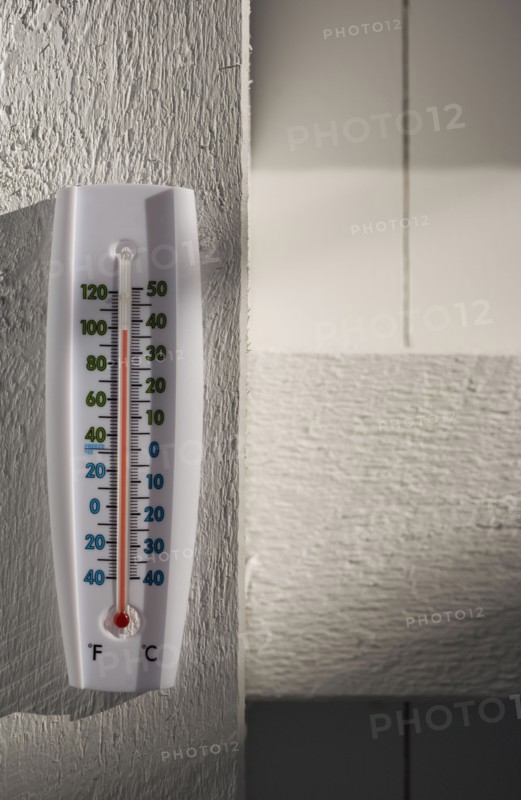 Thermometer on wall. Photo. Chris Hackett