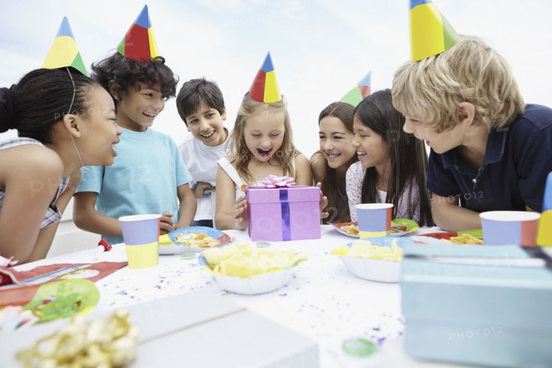 Children at a birthday celebration. Photo. momentimages