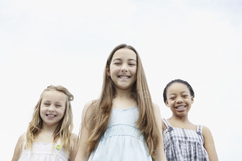 Three young girls. Photo. momentimages