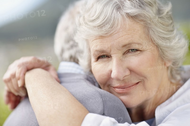 Senior couple hugging. Photo. momentimages