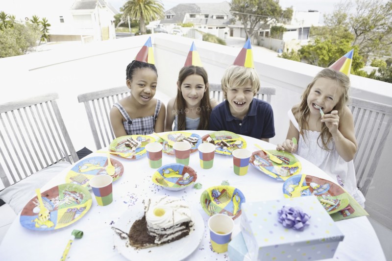 Children at a birthday party. Photo. momentimages
