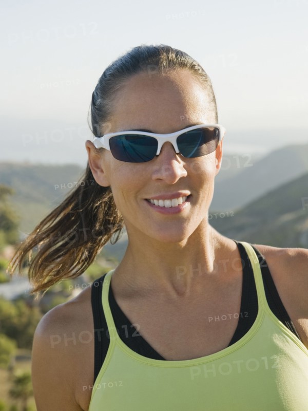 Trail runner wearing sunglasses. Photo. Erik Isakson