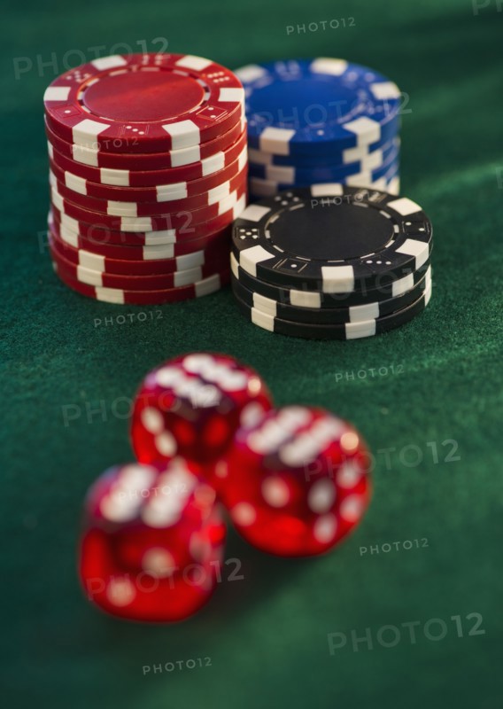 Poker chips and dice. Photo. Daniel Grill