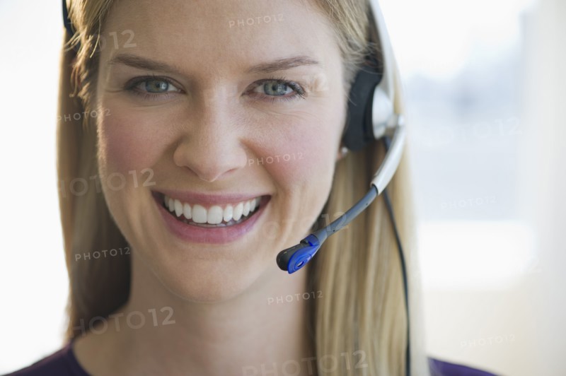 Woman wearing headset.