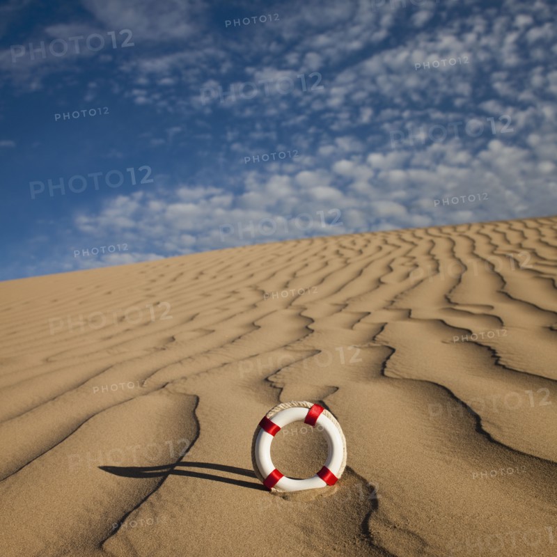 Lifebuoy in desert. Photo. Mike Kemp