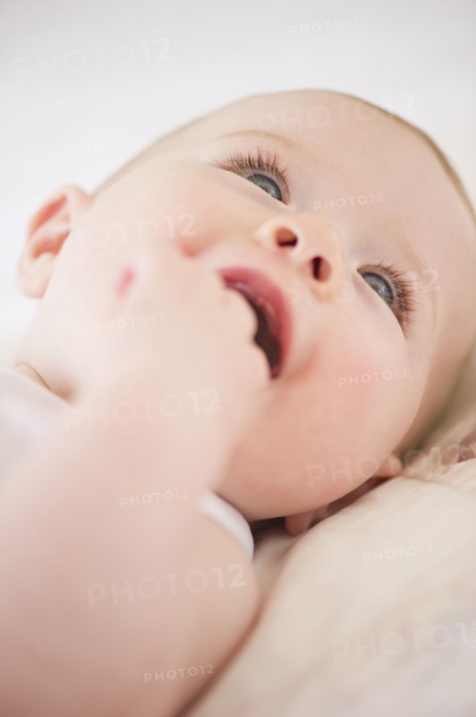 Baby lying down. Photo : Jamie Grill