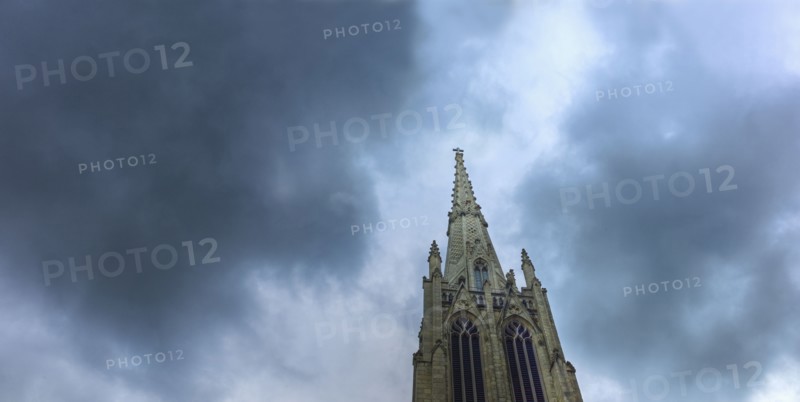 Dark clouds over steeple on Grace Church.