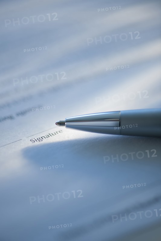 Pen and signature line.