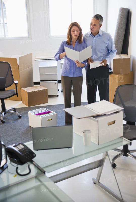 Business entrepreneurs working in startup office.