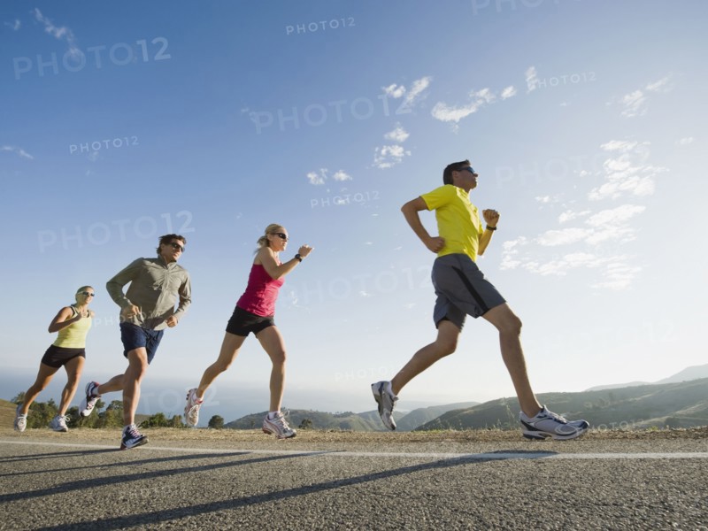 Runners on a road in Malibu. Photo. Erik Isakson