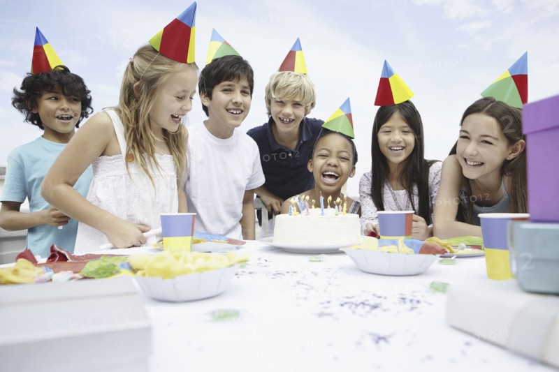 Children at a birthday celebration. Photo. momentimages