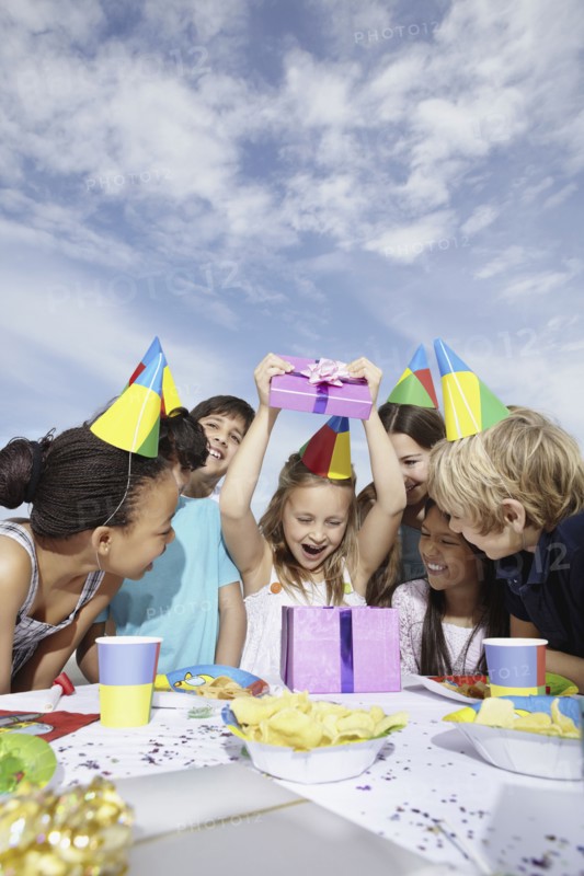 Children at a birthday celebration. Photo. momentimages