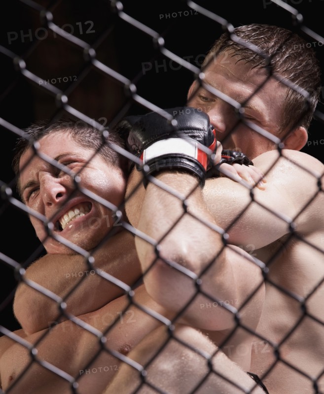Cage fighters. Photo. Mike Kemp