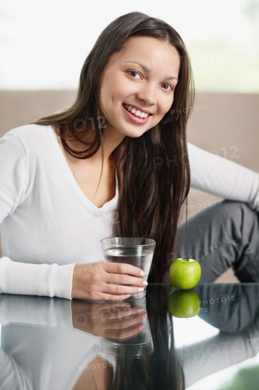 Woman having a healthy snack. Photo. momentimages