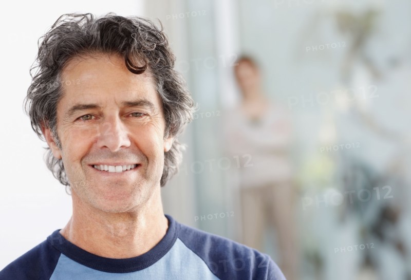 Cheerful handsome man. Photo. momentimages