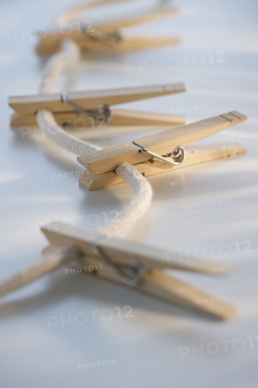 Clothespins on clothesline. Photo. Daniel Grill