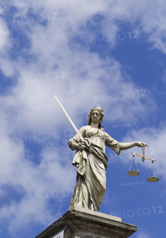 Scales of justice statue on the Dublin castle.