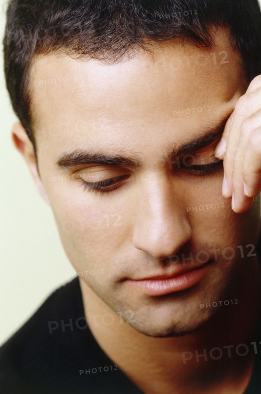 Worried man. Photo : Fisher Litwin