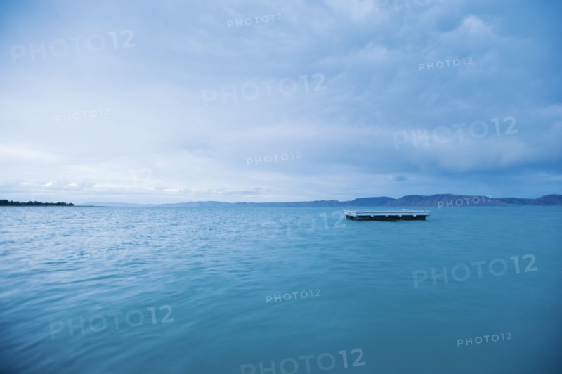 Raft floating on water.