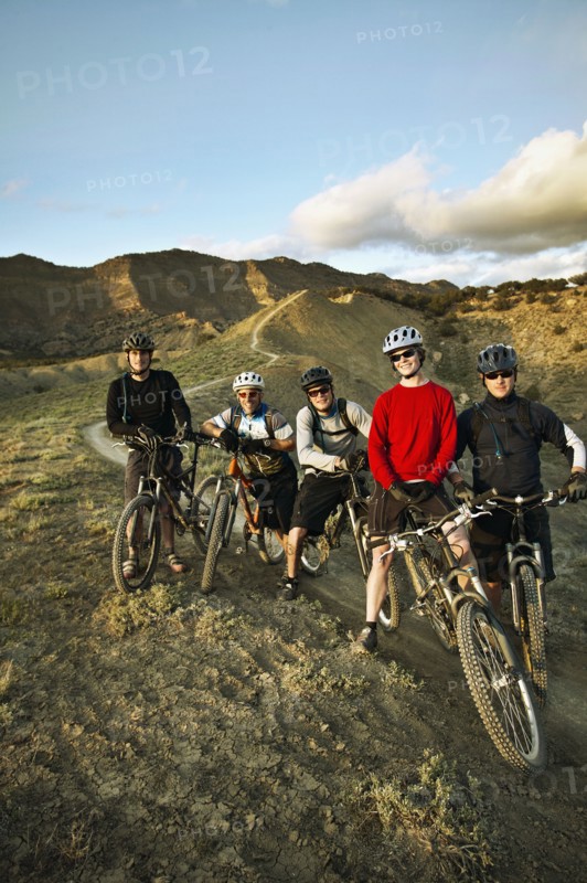 Portrait of mountain bikers in mountains. Photo : Shawn O'Connor