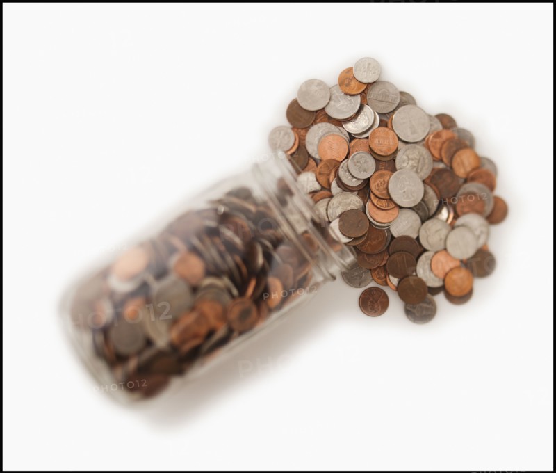 Jar of coins. Photo : Mike Kemp