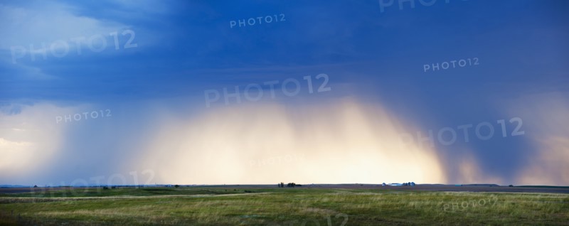 Cloudscape over field.