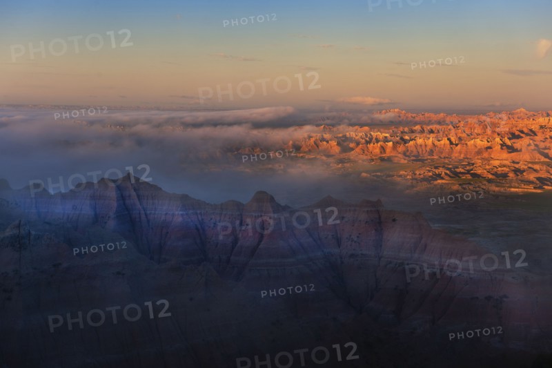 USA, South Dakota, Mountains in Badlands National Park at sunset.