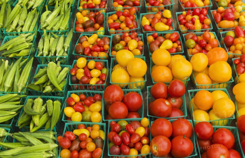 Boxes with vegetables on street market.