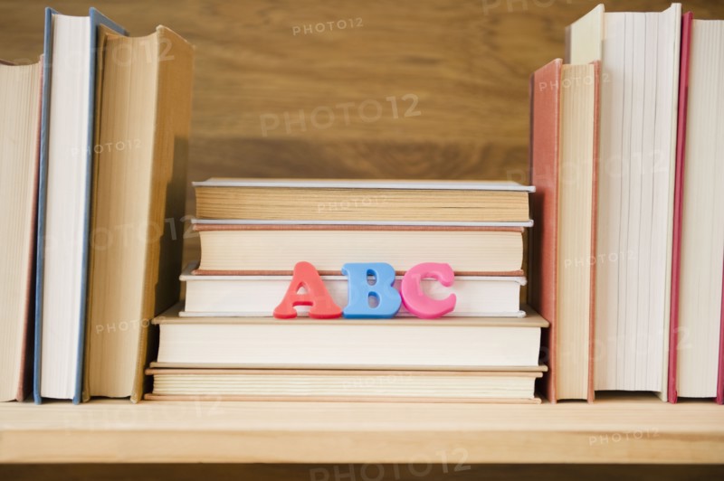 Row of books on shelf. Photo : Jamie Grill
