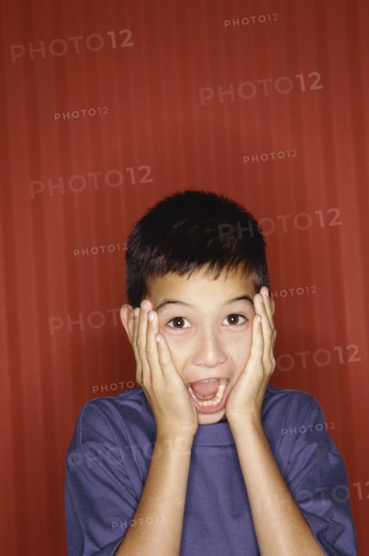 Surprised young boy. Photo : Fisher Litwin