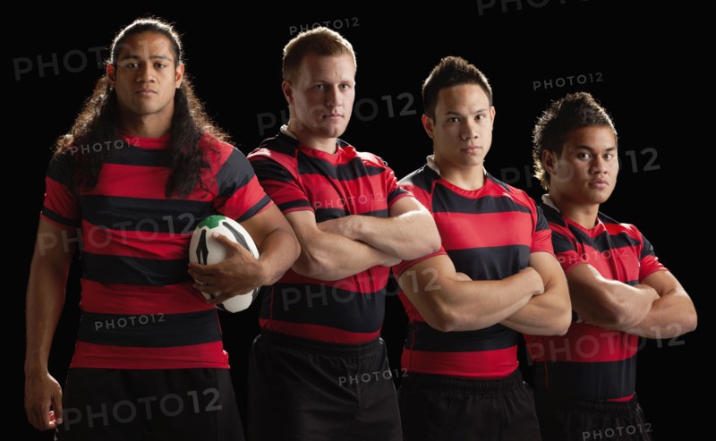 Studio portrait of male rugby team. Photo : Mike Kemp