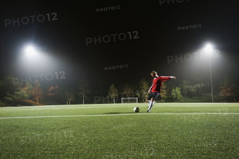 USA, California, Ladera Ranch, Football player preparing for penalty kick.