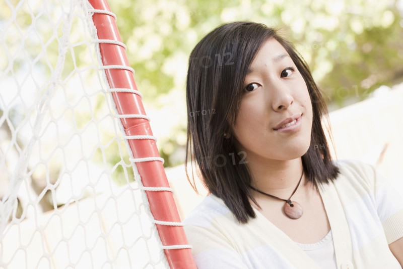 USA, Utah, portrait of young woman near goalpost. Photo : Tim Pannell