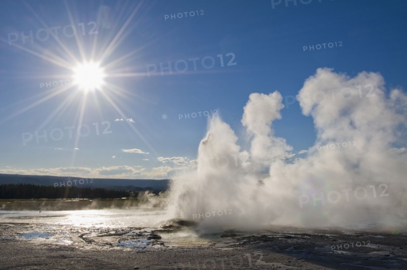 USA, Wyoming, Sun over steaming thermal pool. Photo : Gary J Weathers