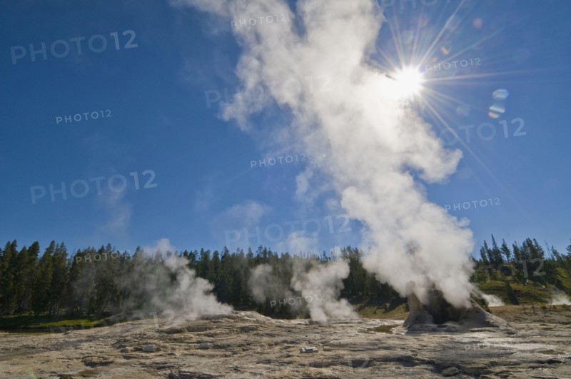 USA, Wyoming, Sun over steaming thermal pool. Photo : Gary J Weathers