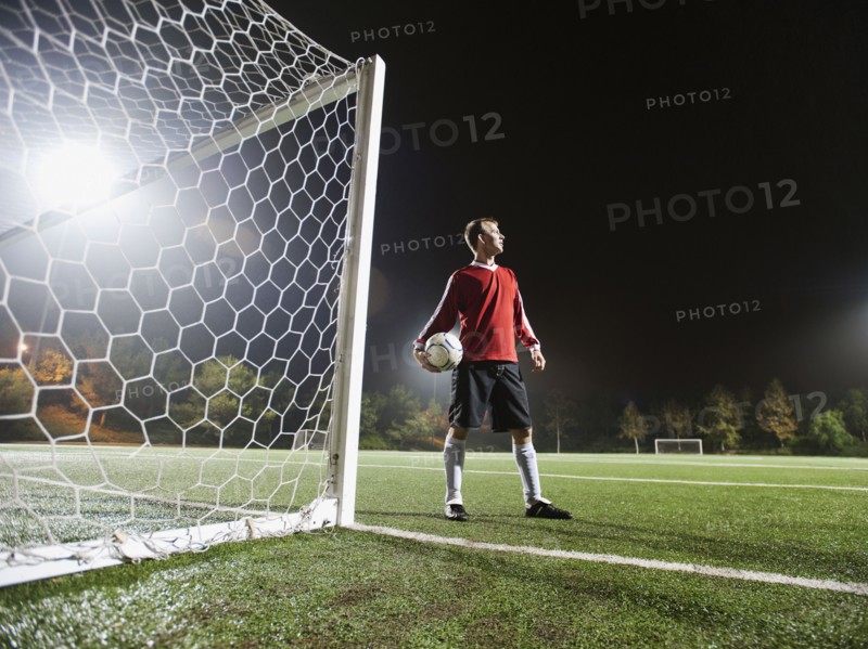 USA, California, Ladera Ranch, Football player preparing for penalty kick.