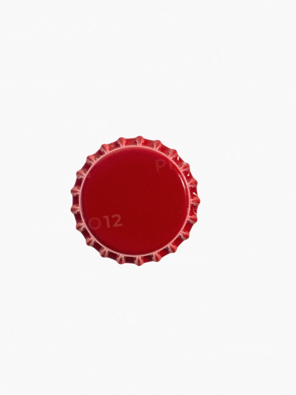 Studio shot of red bottle cap. Photo : David Arky