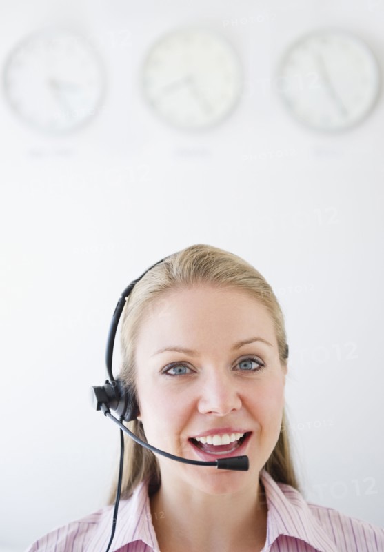 USA, New Jersey, Jersey City, Portrait of young female call centre agent. Photo : Jamie Grill Photography