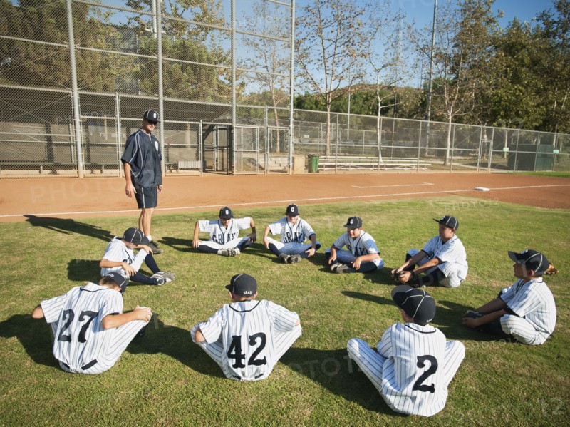 USA, California, Ladera Ranch, Coach training boys (10-11) from little league.