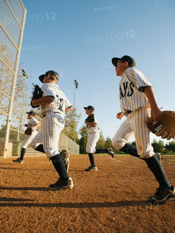 USA, California, Ladera Ranch, boys (10-11) playing baseball.