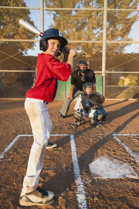 USA, California, Ladera Ranch, boys (10-11) playing baseball.