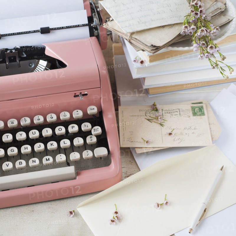 Letters by antique typewriter.
