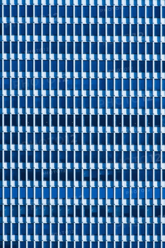 USA, New York, New York City, Windows of office block.