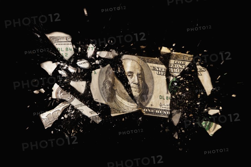 Cracked one hundred dollar bill. Photo : Mike Kemp