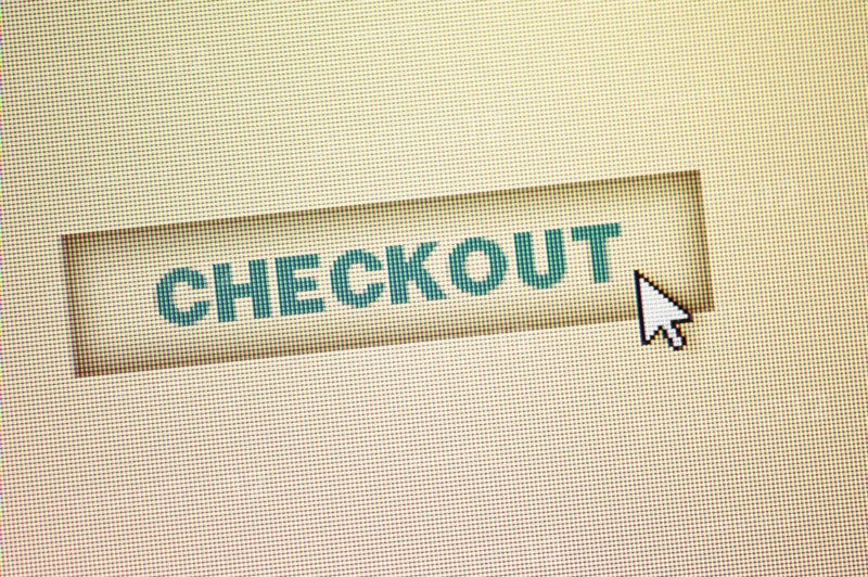 Curser by checkout icon on computer screen.