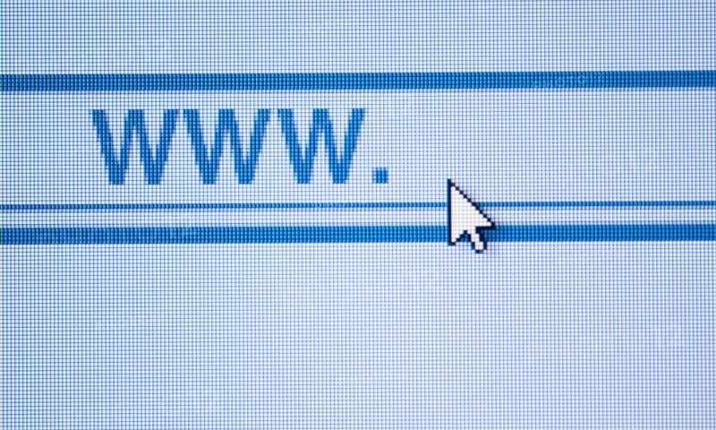 Curser by www icon on computer screen.