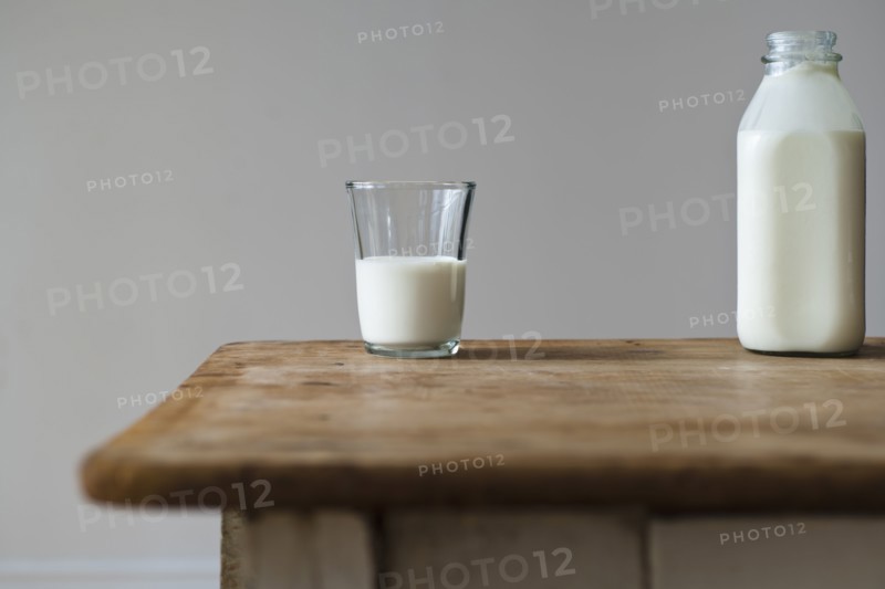 Glass and bottle of milk.