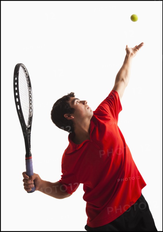 Young man playing tenni